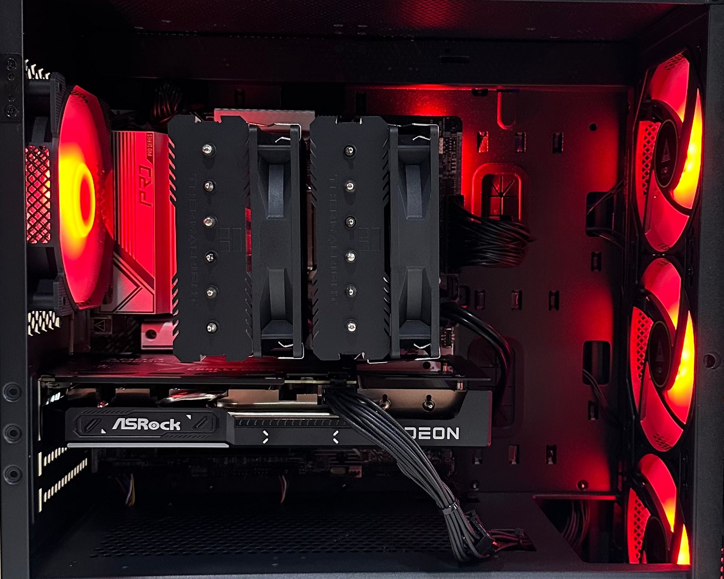 Computer case with red lighting and Montech branding